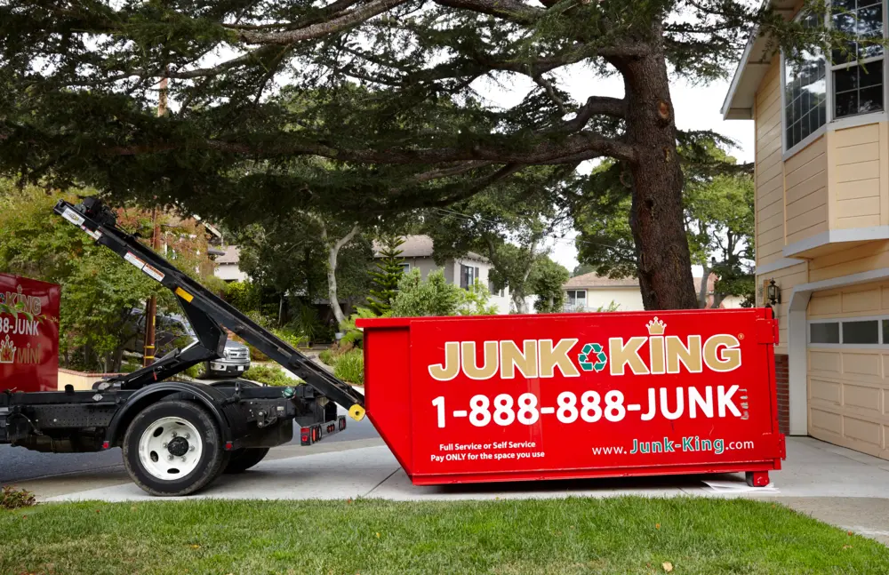 Dumpster rental from Junk King placed at a Burlingame home