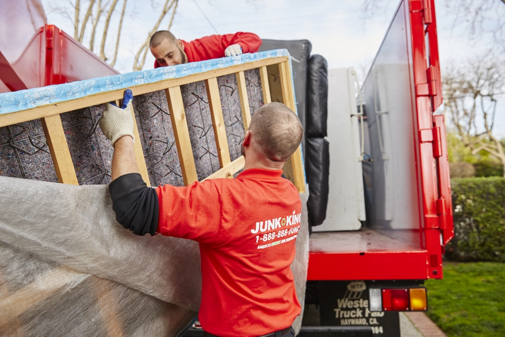 Old furniture being removed from a Palo Alto home by Junk King Peninsula