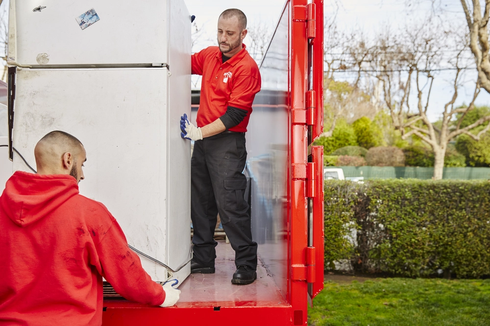 Junk King truck providing junk removal services in San Carlos