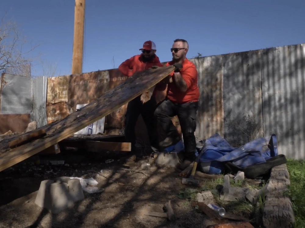 Junk King crew removing construction debris from a project site in Ashbury Heights